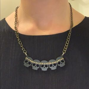 Ethnika handmade skull necklace.